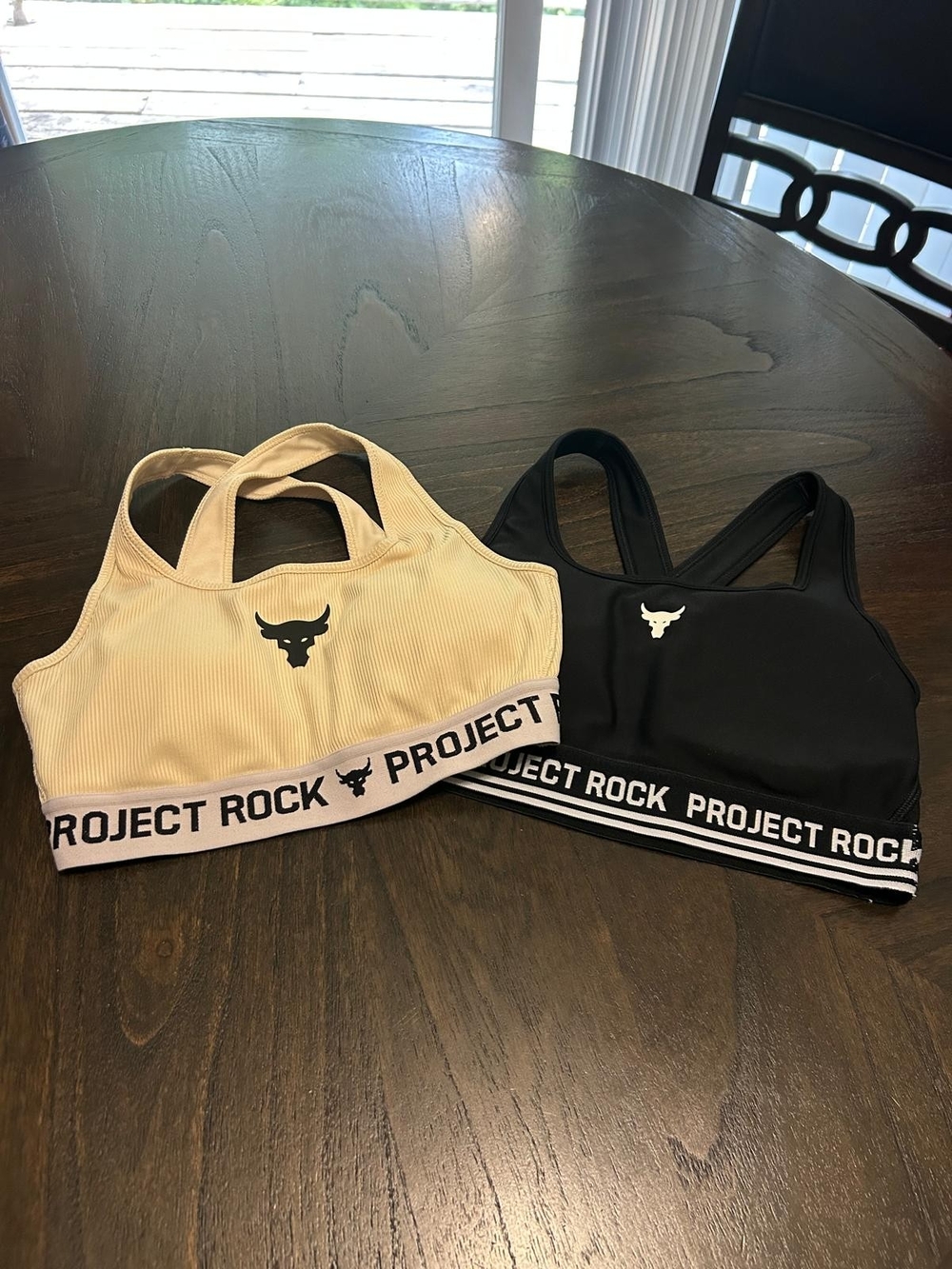 Under Armour Project Rock Ribbed Sports Bras in Black and Cream